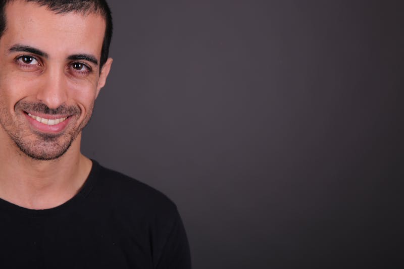 Head chef crafting seasons pizza in the kitchen