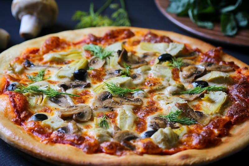 Truffle season pizza with premium seasonal mushrooms